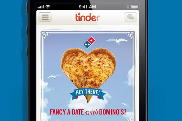 Tinder advertising example with Domino’s distributing pizza coupons