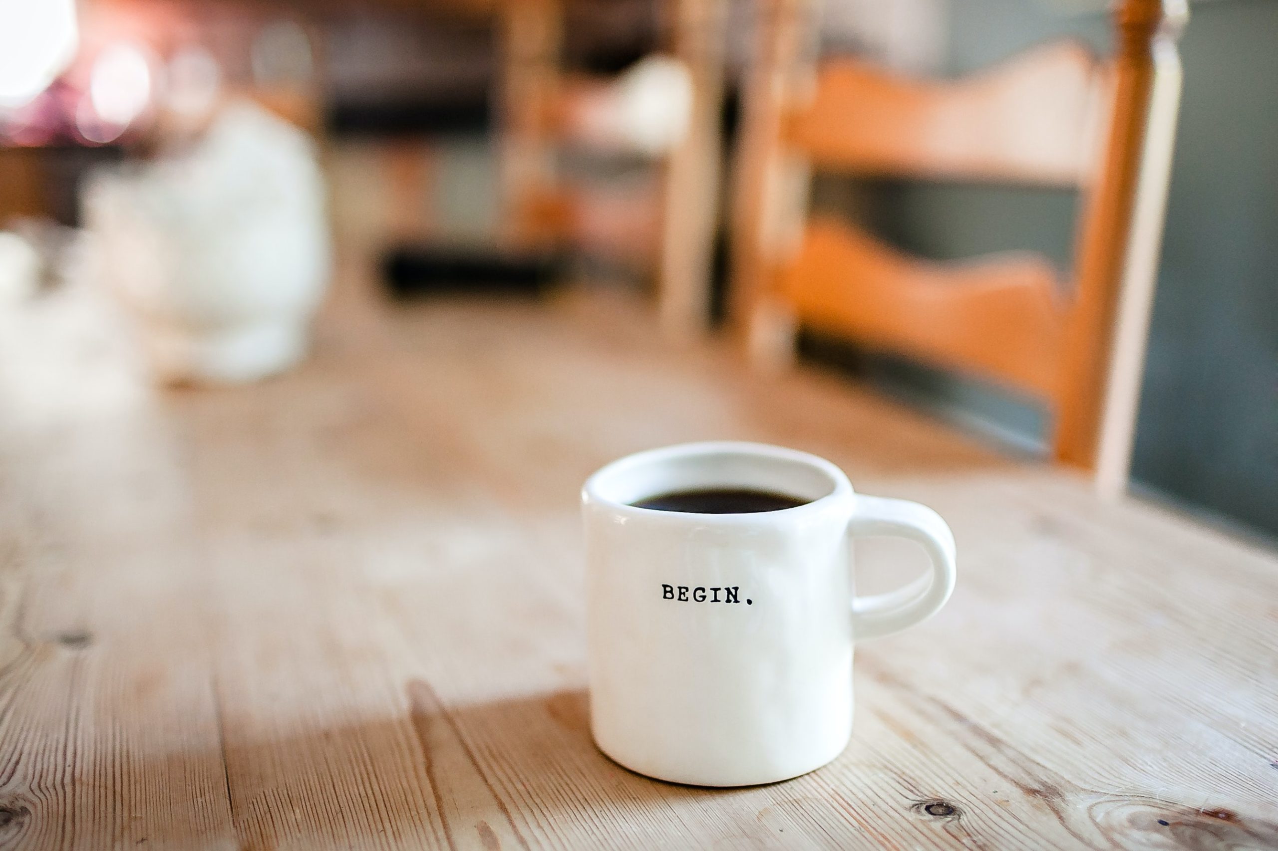 coffee mug with the word begin on it