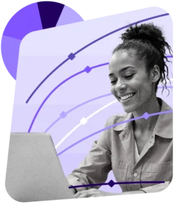 woman smiling in front of laptop