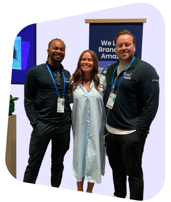 Tinutians standing in front of Unboxed booth