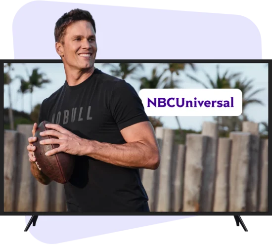 football player wearing NOBULL shirt in front of tv and NBCUniversal logo