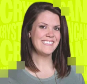 woman smiling in front of bright green background