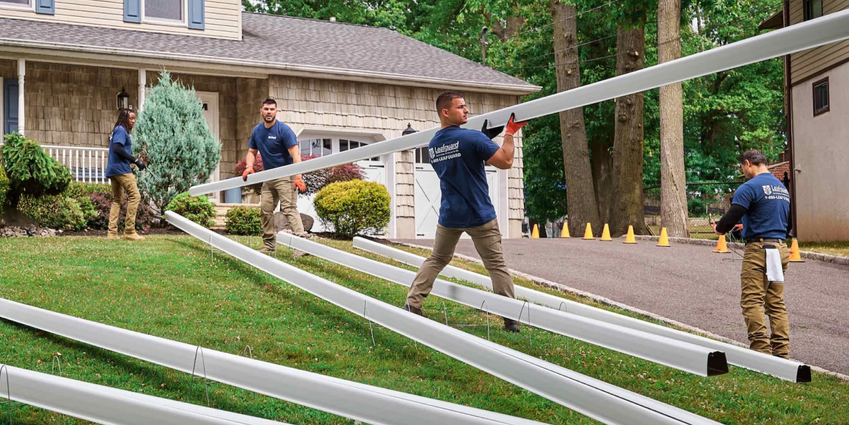 group of men installing Leafguard