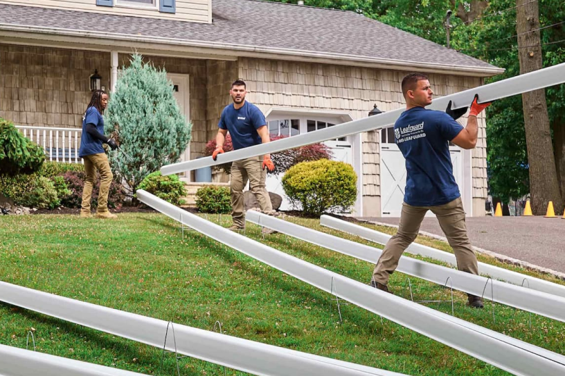 group of men installing Leafguard