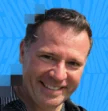 man smiling at the camera