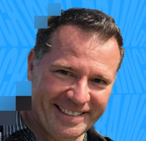man smiling at the camera