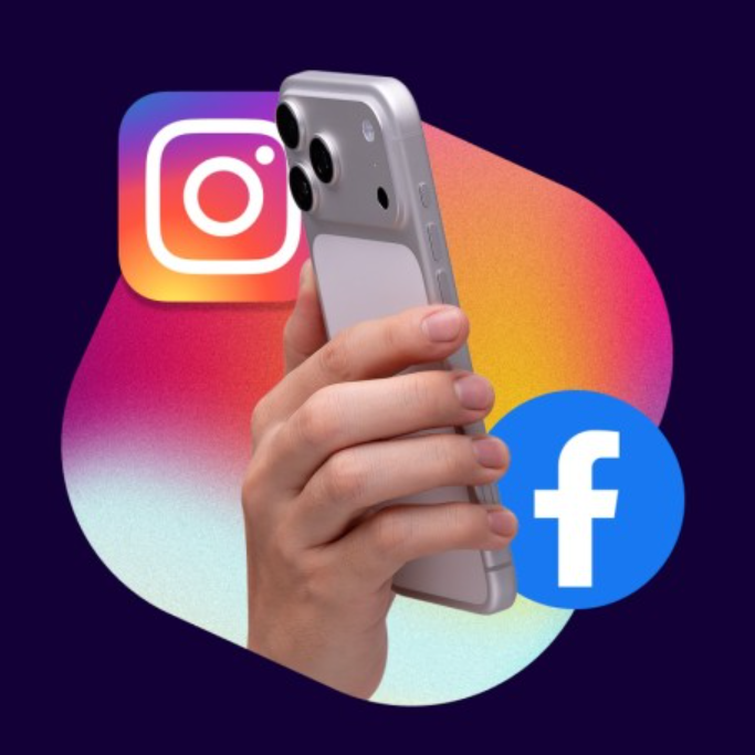 hand holding phone and Facebook and Instagram logos