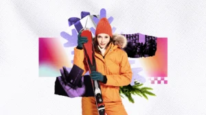 woman carrying skis