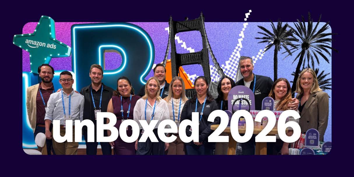 People standing before the San Francisco Bridge and text 'unBoxed 2026'